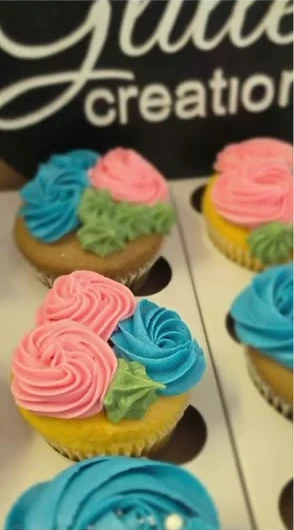 Cupcakes with colourful buttercream roses